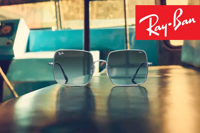 who owns ray ban brand
